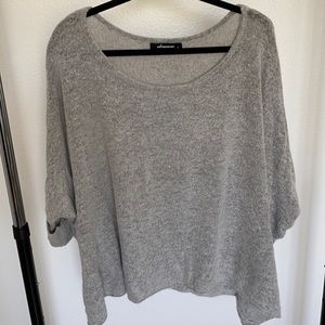 Gray soft throw over sweater